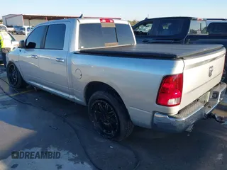 2014 Ram 1500 Big Horn with VIN 1C6RR6LT1ES180291, listed as a IAAI auction lot 40962366 with 131,763 mi miles and . Bid and sale history available at DreamBid. Image 3.