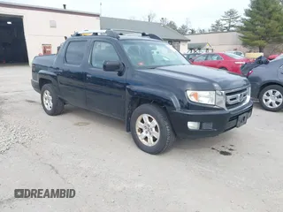 2011 Honda Ridgeline RTS with VIN 5FPYK1F4XBB453373, listed as a IAAI auction lot 41837086 with 268,041 mi miles. Bid and sale history available at carsss.com. Image 1.