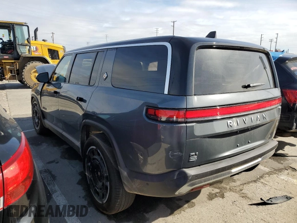 2025 Rivian R1S Adventure z VIN 7PDSGBBA5SN048839, wystawiony jako Copart lot #89199375 z przebiegiem 5177 mil mil oraz Szkody całkowita. Historia ofert i sprzedaży dostępna na DreamBid. Obrazek 2.