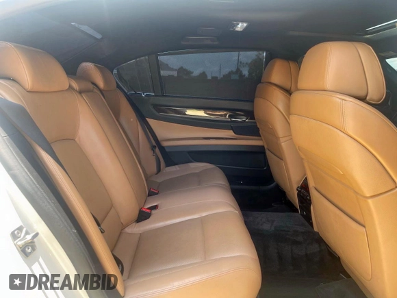2010 BMW 7 Series 750Li with VIN WBAKB8C58ACY64395, listed as a Copart auction lot 63885205 with 137,375 mi miles and Salvage title. Bid and sale history available at DreamBid. Image 6.