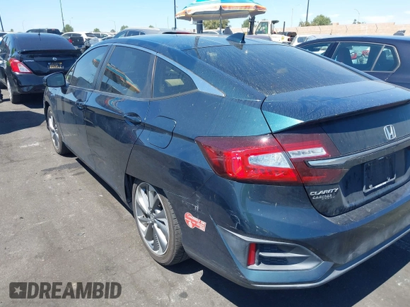 2018 Honda Clarity Touring with VIN JHMZC5F3XJC006383, listed as a IAAI auction lot 41996524 with 100,646 mi miles and . Bid and sale history available at DreamBid. Image 3.