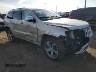 2015 Jeep Grand Cherokee Overland with VIN 1C4RJFCG9FC681699, listed as a Copart auction lot 49292195 with 144,133 mi miles and Clean Title. Bid and sale history available at carsss.com. Image 4.