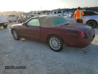 2004 Ford Thunderbird Deluxe with VIN 1FAHP60A14Y111339, listed as a Copart auction lot 77588194 with Not Provided miles and Salvage Title. Bid and sale history available at DreamBid. Image 2.