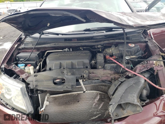 2015 Honda Odyssey Touring Elite with VIN 5FNRL5H98FB033336, listed as a Copart auction lot 57092355 with 186,046 mi miles and Salvage title. Bid and sale history available at DreamBid. Image 12.