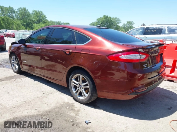 2016 Ford Fusion SE Hybrid with VIN 3FA6P0LU3GR143688, listed as a IAAI auction lot 42269789 with 163,910 mi miles and . Bid and sale history available at DreamBid. Image 3.