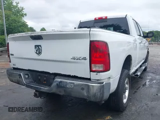 2013 Ram 2500 SLT z VIN 3C6TR5DT7DG524758, wystawiony jako IAAI lot #42333873 z przebiegiem Nie podano mil oraz . Historia ofert i sprzedaży dostępna na DreamBid. Obrazek 4.
