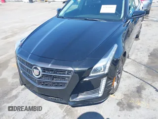 2014 Cadillac CTS RWD with VIN 1G6AP5SX0E0126103, listed as a IAAI auction lot 42160002 with 49,187 mi miles and . Bid and sale history available at DreamBid. Image 6.
