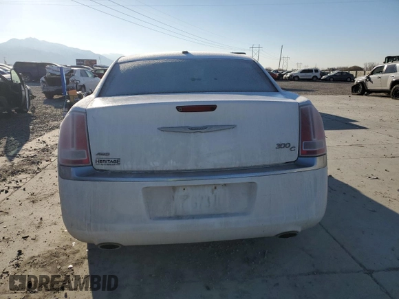 2014 Chrysler 300 C with VIN 2C3CCAKG6EH200991, listed as a Copart auction lot 42730885 with 82,128 mi miles and Salvage Title. Bid and sale history available at carsss.com. Image 6.