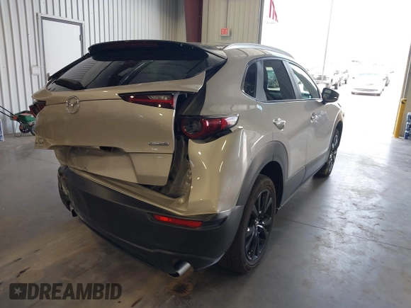 2024 Mazda CX-30 S Select Sport with VIN 3MVDMBBM0RM698491, listed as a IAAI auction lot 42609161 with 21,576 mi miles and . Bid and sale history available at DreamBid. Image 4.