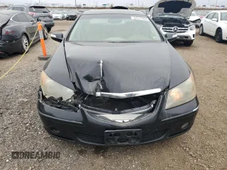 2007 Acura RL Technology z VIN JH4KB16697C002275, wystawiony jako Copart lot #82517284 z przebiegiem 200 857 mil mil oraz Czysty tytuł • Clean title. Historia ofert i sprzedaży dostępna na DreamBid. Obrazek 5.
