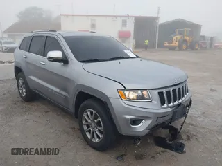 2015 Jeep Grand Cherokee Limited with VIN 1C4RJFBG5FC732732, listed as a IAAI auction lot 41478553 with 174,842 mi miles. Bid and sale history available at carsss.com. Image 1.