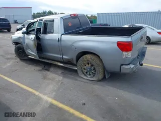 2010 Toyota Tundra 2WD Truck with VIN 5TFRM5F18AX019641, listed as a IAAI auction lot 39478240 with 241,424 mi miles. Bid and sale history available at carsss.com. Image 3.