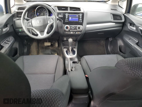 2020 Honda Fit LX with VIN 3HGGK5H49LM703516, listed as a Copart auction lot 58334085 with 58,986 mi miles and Salvage title. Bid and sale history available at DreamBid. Image 8.