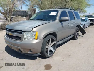 2007 Chevrolet Tahoe LT z VIN 1GNFC13077R226276, wystawiony jako IAAI lot #42232796 z przebiegiem 169 595 mil mil oraz . Historia ofert i sprzedaży dostępna na DreamBid. Obrazek 2.