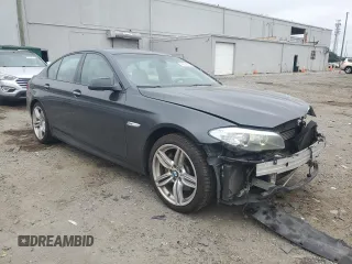 2013 BMW 5 Series 535i xDrive with VIN WBAFU7C5XDDU67579, listed as a Copart auction lot 62639525 with 145,984 mi miles and Salvage title. Bid and sale history available at DreamBid. Image 4.