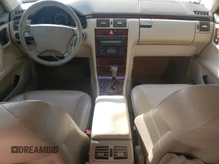 1999 Mercedes-Benz E-Class with VIN WDBJF65HXXA891437, listed as a Copart auction lot 73278334 with 197,159 mi miles and Salvage Title. Bid and sale history available at carsss.com. Image 8.