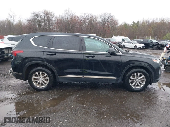 2019 Hyundai Santa Fe SE with VIN 5NMS23AD8KH008680, listed as a IAAI auction lot 42023218 with 67,745 mi miles and . Bid and sale history available at DreamBid. Image 13.