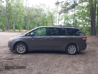 2011 Toyota Sienna XLE AAS with VIN 5TDYK3DC8BS016319, listed as a IAAI auction lot 42186294 with 293,401 mi miles and . Bid and sale history available at DreamBid. Image 14.
