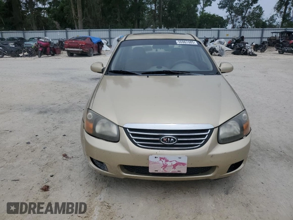 2009 Kia Spectra EX with VIN KNAFE221X95648679, listed as a Copart auction lot 55967485 with 182,740 mi miles and Non Repairable. Bid and sale history available at DreamBid. Image 5.
