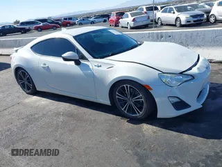 2015 Scion FR-S with VIN JF1ZNAA12F9709707, listed as a IAAI auction lot 41545940 with 107,575 mi miles. Bid and sale history available at carsss.com. Image 18.