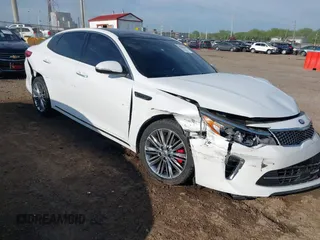 2018 Kia Optima SX with VIN 5XXGV4L2XJG209198, listed as a IAAI auction lot 42206440 with 113,094 mi miles and . Bid and sale history available at DreamBid. Image 1.