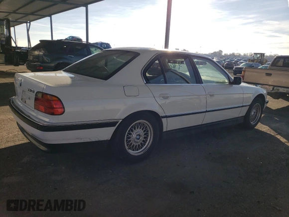 1995 BMW 7 Series 740i with VIN WBAGF6320SDH05311, listed as a Copart auction lot 86376034 with 200,275 mi miles and Salvage Title. Bid and sale history available at carsss.com. Image 3.