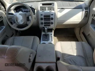 2010 Mercury Mariner Premier с VIN 4M2CN9H78AKJ26918, выставлен на аукционе Copart как лот 56000095 с пробегом 195 357 миль миль и Списание • Salvage title. История ставок и продаж доступна на DreamBid. Изображение 8.
