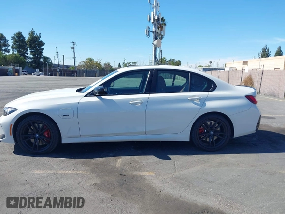 2023 BMW 3 Series 330e with VIN 3MW39FF02P8C89795, listed as a IAAI auction lot 41648172 with 27,179 mi miles. Bid and sale history available at carsss.com. Image 14.