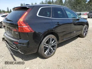 2018 Volvo XC60 R-Design z VIN YV4A22RM8J1000966, wystawiony jako Copart lot #56019245 z przebiegiem 69 195 mil mil oraz Szkoda całkowita • Salvage title. Historia ofert i sprzedaży dostępna na DreamBid. Obrazek 3.