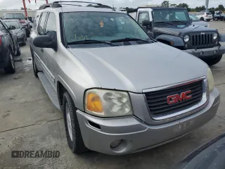 2005 GMC Envoy SLT with VIN 1GKET16S656102004, listed as a Copart auction lot 74543124 with Not Provided miles and Salvage Title. Bid and sale history available at DreamBid. Image 5.