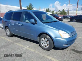 2009 Kia Sedona LX with VIN KNDMB233396300879, listed as a IAAI auction lot 41753122 with 183,754 mi miles. Bid and sale history available at carsss.com. Image 1.