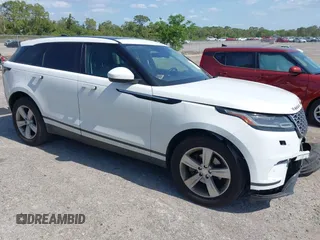 2020 Land Rover Range Rover Velar S z VIN SALYB2EX7LA252141, wystawiony jako IAAI lot #42131779 z przebiegiem 101 612 mil mil oraz . Historia ofert i sprzedaży dostępna na DreamBid. Obrazek 1.