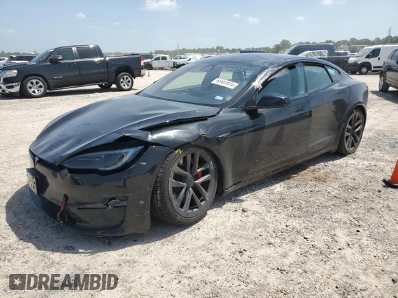 2023 Tesla Model S Plaid with VIN 5YJSA1E62PF511875, listed as a Copart auction lot 65583824 with Not provided miles and Salvage title. Bid and sale history available at DreamBid. Image 1.