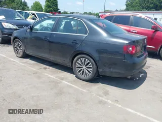 2009 Volkswagen Jetta SE with VIN 3VWRM71K79M166916, listed as a IAAI auction lot 42400659 with 166,061 mi miles and . Bid and sale history available at DreamBid. Image 3.