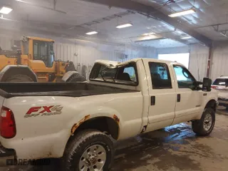 2003 Ford Super Duty F-350 SRW XL with VIN 1FTSW31P23EC17321, listed as a IAAI auction lot 41292702 with 114,178 mi miles. Bid and sale history available at carsss.com. Image 6.