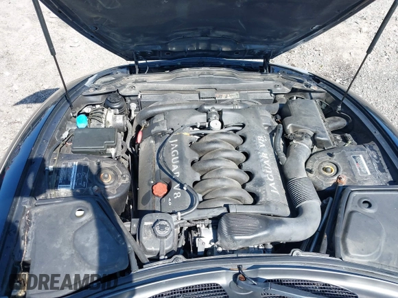 2002 Jaguar XK with VIN SAJDA42C12NA30499, listed as a IAAI auction lot 41954577 with 77,152 mi miles and . Bid and sale history available at DreamBid. Image 13.