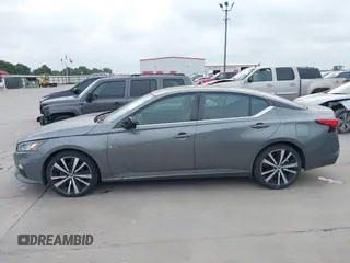2022 Nissan Altima SR z VIN 1N4BL4CV0NN386112, wystawiony jako IAAI lot #42161567 z przebiegiem 56 402 mil mil oraz . Historia ofert i sprzedaży dostępna na DreamBid. Obrazek 14.