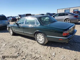 2001 Jaguar XJ with VIN SAJDA14CX1LF26357, listed as a Copart auction lot 80168144 with 82,512 mi miles and Clean Title. Bid and sale history available at carsss.com. Image 2.