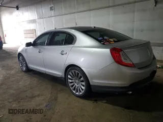 2013 Lincoln MKS with VIN 1LNHL9EK6DG615623, listed as a Copart auction lot 51247625 with 127,982 mi miles and Clean title. Bid and sale history available at DreamBid. Image 2.