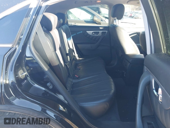 2013 Infiniti FX z VIN JN8CS1MUXDM140215, wystawiony jako IAAI lot #41271039 z przebiegiem 134 887 mil mil oraz . Historia ofert i sprzedaży dostępna na DreamBid. Obrazek 8.