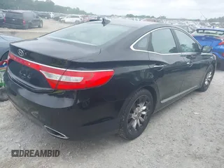 2013 Hyundai Azera z VIN KMHFH4JG4DA243182, wystawiony jako IAAI lot #42403300 z przebiegiem 237 975 mil mil oraz . Historia ofert i sprzedaży dostępna na DreamBid. Obrazek 4.