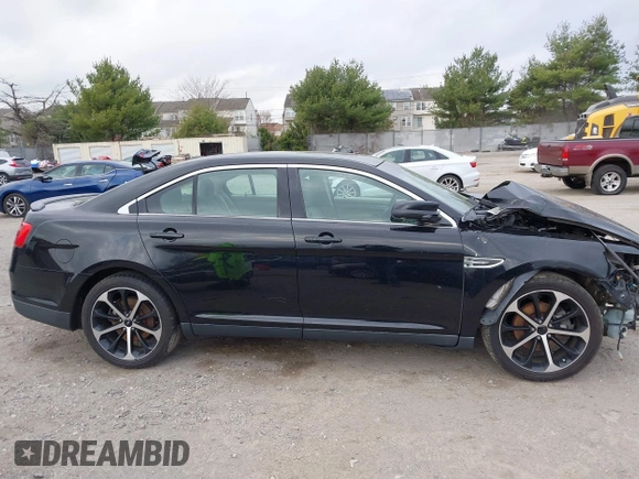2016 Ford Taurus SEL z VIN 1FAHP2H80GG130887, wystawiony jako IAAI lot #41911575 z przebiegiem 138 469 mil mil oraz . Historia ofert i sprzedaży dostępna na DreamBid. Obrazek 13.