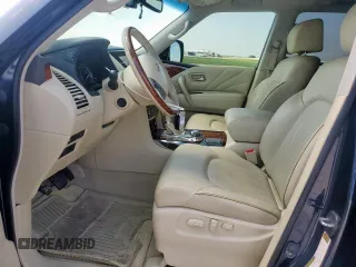 2015 Infiniti QX80 z VIN JN8AZ2NE5F9087834, wystawiony jako Copart lot #60919505 z przebiegiem 42 526 mil mil oraz Szkoda całkowita • Salvage title. Historia ofert i sprzedaży dostępna na DreamBid. Obrazek 7.