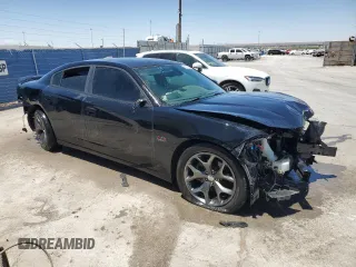 2015 Dodge Charger RT with VIN 2C3CDXCT9FH918273, listed as a Copart auction lot 55605814 with 101,521 mi miles and Clean Title. Bid and sale history available at DreamBid. Image 4.
