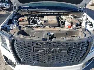 2021 GMC Yukon XL Denali with VIN 1GKS2JKT1MR401207, listed as a IAAI auction lot 41242619 with 87,902 mi miles and . Bid and sale history available at carsss.com. Image 10.