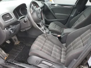 2011 Volkswagen GTI w/Sunroof & Navi PZEV z VIN WVWGD7AJ8BW312571, wystawiony jako Copart lot #45567945 z przebiegiem 155 022 mil mil oraz Szkoda całkowita • Salvage title. Historia ofert i sprzedaży dostępna na DreamBid. Obrazek 7.