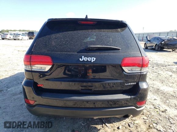 2017 Jeep Grand Cherokee Laredo with VIN 1C4RJEAG4HC952605, listed as a Copart auction lot 56693145 with 115,035 mi miles and Salvage title. Bid and sale history available at DreamBid. Image 6.