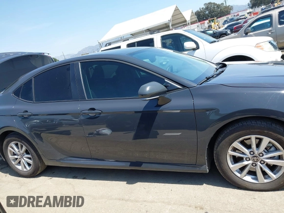 2025 Toyota Camry LE with VIN 4T1DAACK5SU008796, listed as a IAAI auction lot 41978714 with 20,225 mi miles and . Bid and sale history available at DreamBid. Image 14.