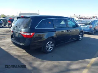 2012 Honda Odyssey EX-L with VIN 5FNRL5H68CB025481, listed as a IAAI auction lot 41979121 with Not Provided miles and . Bid and sale history available at DreamBid. Image 4.