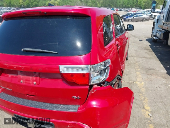 2013 Dodge Durango R/T with VIN 1C4SDJCT0DC686103, listed as a IAAI auction lot 41985034 with 117,212 mi miles and . Bid and sale history available at DreamBid. Image 6.
